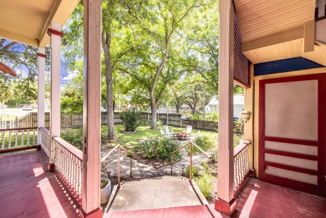 624 Saint Louis St, Gonzales, TX 78629 - fenced backyard featuring a wooden deck