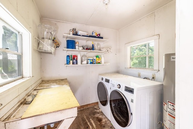624 Saint Louis St, Gonzales, TX 78629 - laundry room featuring washer and dryer and water heater