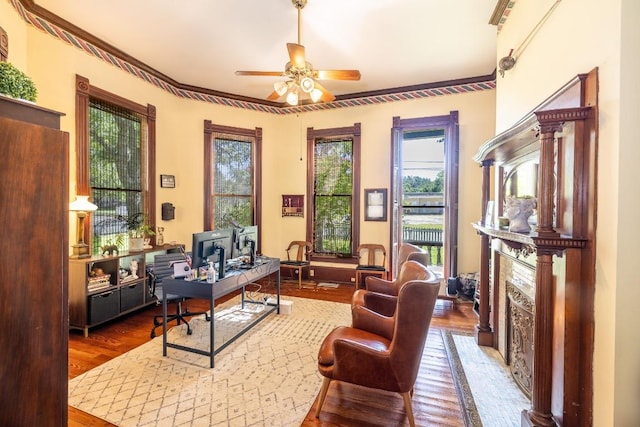 624 Saint Louis St, Gonzales, TX 78629 - office with a ceiling fan and wood finished floors