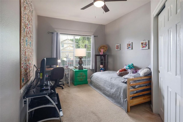 9213 Brents Elm Dr, Austin, TX 78744 - bedroom featuring carpet floors, a desk, ceiling fan, and a closet