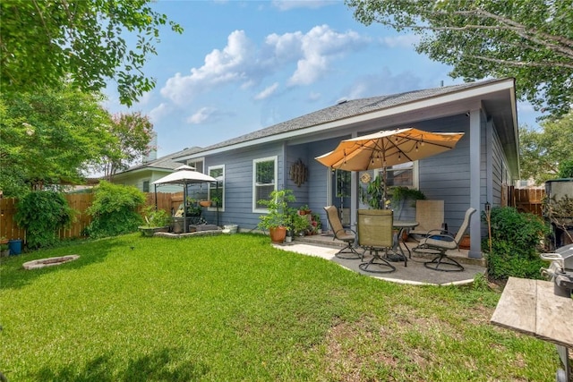 9213 Brents Elm Dr, Austin, TX 78744 - rear view of property with a patio area