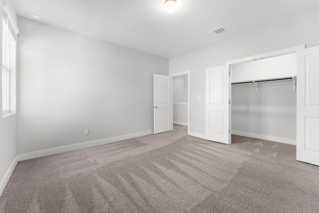 17507 Gitano Pass, Round Rock, TX 78664 - unfurnished bedroom featuring carpet and a closet