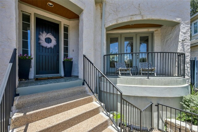 4332 Canoas Dr, Austin, TX 78730 - entrance to property with stucco siding and french doors