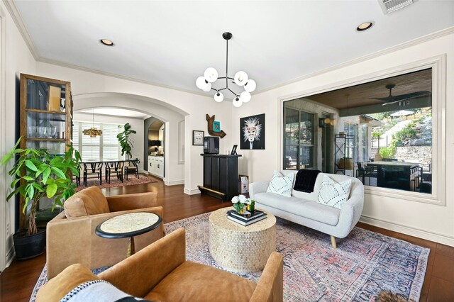 4332 Canoas Dr, Austin, TX 78730 - living room featuring a chandelier, plenty of natural light, wood finished floors, crown molding, and recessed lighting