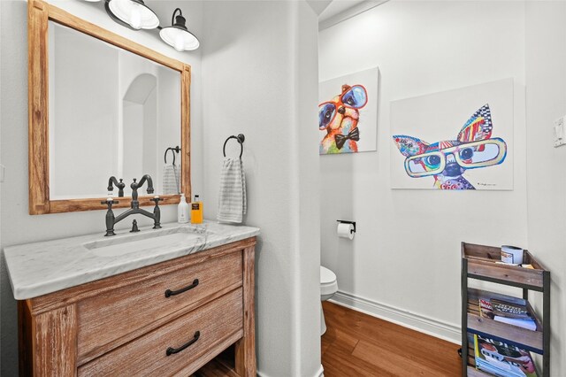 4332 Canoas Dr, Austin, TX 78730 - half bath featuring vanity and wood finished floors
