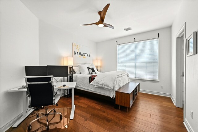 4332 Canoas Dr, Austin, TX 78730 - bedroom featuring a desk, dark wood-type flooring, and a ceiling fan
