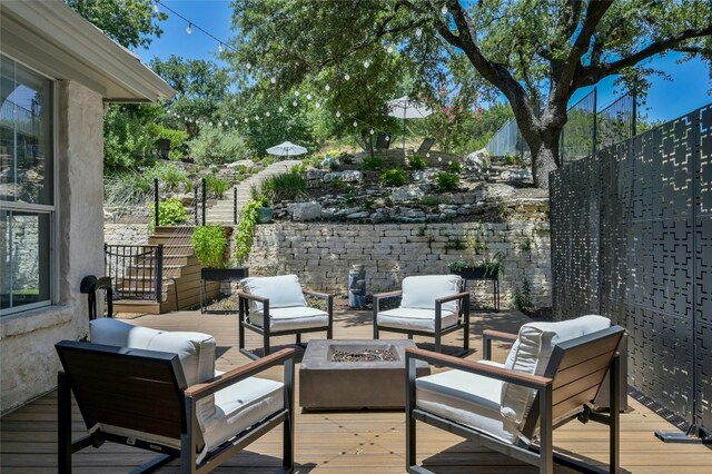 4332 Canoas Dr, Austin, TX 78730 - wooden deck featuring an outdoor living space with a fire pit