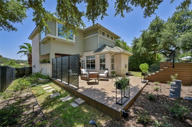4332 Canoas Dr, Austin, TX 78730 - back of house with stucco siding, a wooden deck, a fenced backyard, an outdoor living space, and stairway
