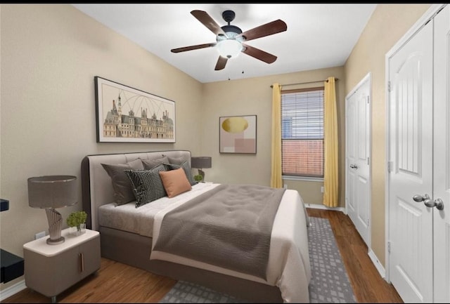600 Gina Dr, Kyle, TX 78640 - bedroom featuring wood finished floors and a ceiling fan