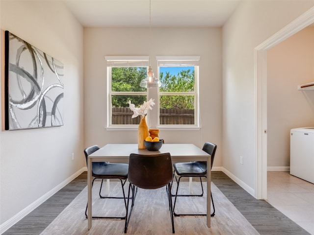 7816 Vista Mejor Dr, Austin, TX 78744 - dining area with wood finished floors and washer / dryer
