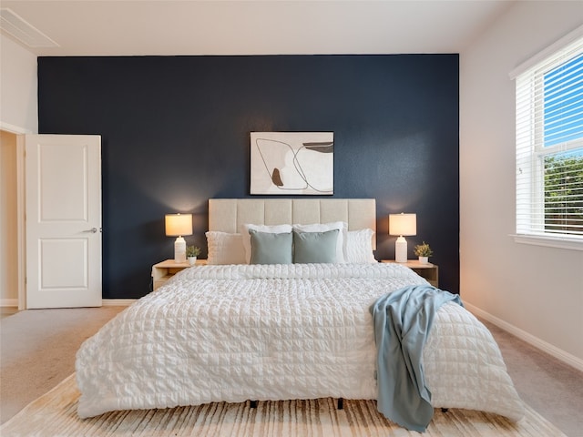 7816 Vista Mejor Dr, Austin, TX 78744 - carpeted bedroom featuring an accent wall