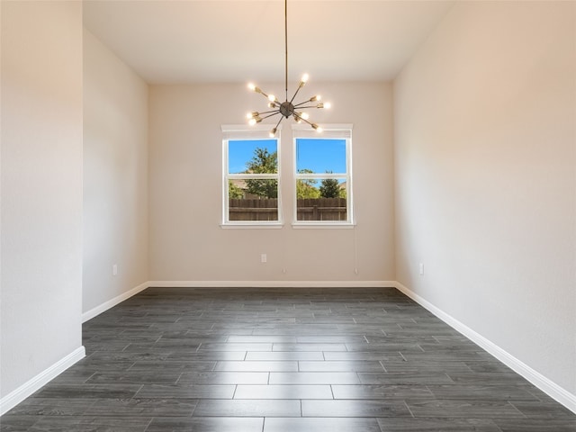7816 Vista Mejor Dr, Austin, TX 78744 - unfurnished room with a chandelier and dark wood-type flooring