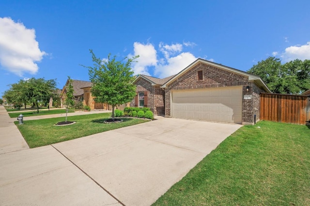 2205 Bonavista Way, Leander, TX 78641 - view of front facade with an attached garage, concrete driveway, and brick siding