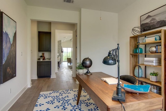 4106 Paleleaf Path, Bee Cave, TX 78738 - home office featuring wood finished floors and baseboards