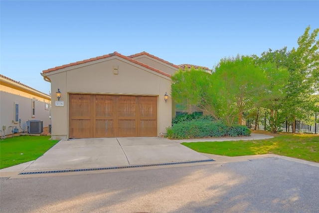 4106 Paleleaf Path, Bee Cave, TX 78738 - view of front facade with stucco siding, concrete driveway, and a garage