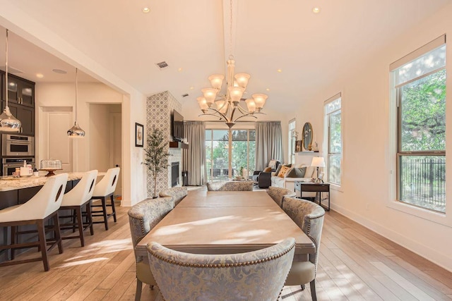 4106 Paleleaf Path, Bee Cave, TX 78738 - dining space featuring a chandelier, light wood-style floors, and recessed lighting