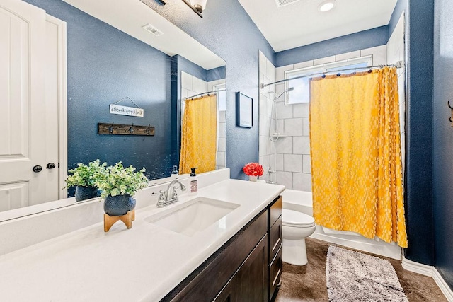 8054 Stone Mountain Trl, San Marcos, TX 78666 - bathroom featuring vanity, shower / bath combo, and a textured wall