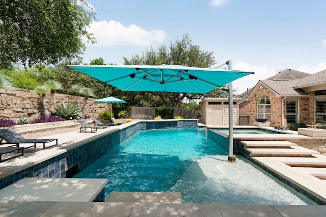 207 Dry Creek Rd, Austin, TX 78737 - view of swimming pool featuring a patio, a storage unit, a fenced backyard, and a pool with connected hot tub
