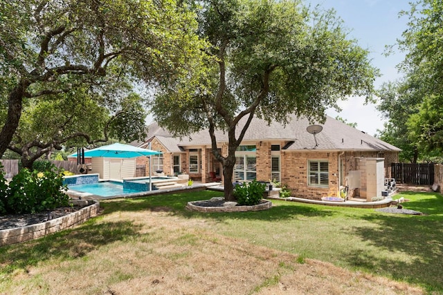 207 Dry Creek Rd, Austin, TX 78737 - rear view of house featuring brick siding, a fenced backyard, a pool with connected hot tub, and a patio area