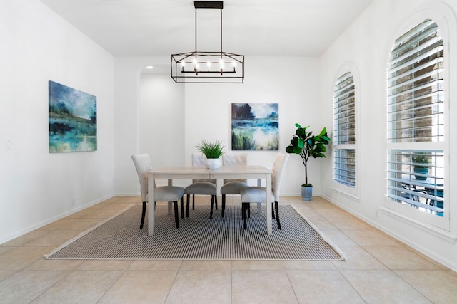 207 Dry Creek Rd, Austin, TX 78737 - dining area featuring tile patterned flooring and a chandelier