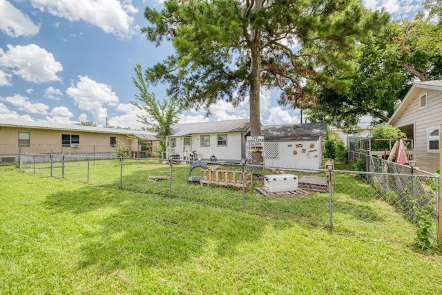 105 San Jacinto St, Smithville, TX 78957 - fenced backyard with an outdoor structure