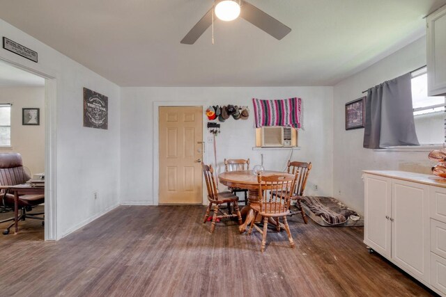 105 San Jacinto St, Smithville, TX 78957 - dining room featuring cooling unit, plenty of natural light, and wood finished floors