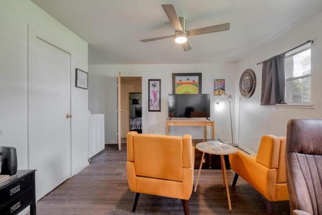 105 San Jacinto St, Smithville, TX 78957 - living room with ceiling fan and dark wood-style floors