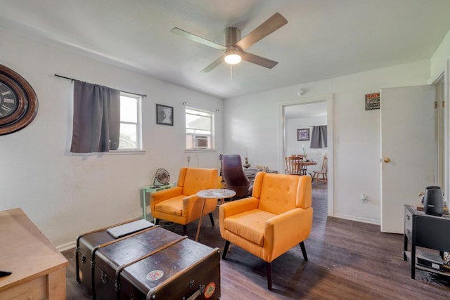 105 San Jacinto St, Smithville, TX 78957 - living room featuring wood finished floors, a ceiling fan, and cooling unit