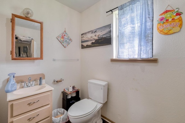 105 San Jacinto St, Smithville, TX 78957 - half bathroom featuring vanity and toilet