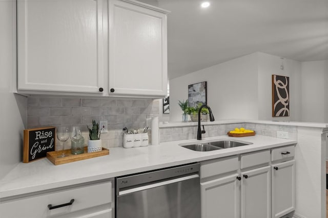 6516 Garden View Dr, Austin, TX 78724 - kitchen with stainless steel dishwasher, a peninsula, backsplash, and light countertops