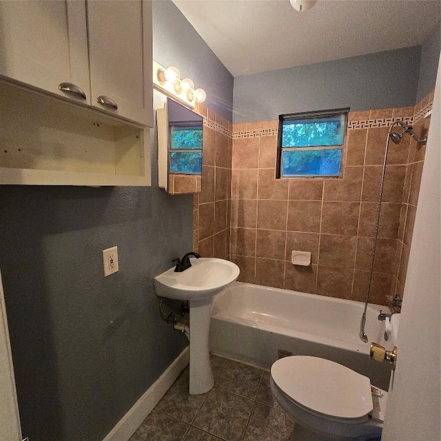 1403 S Salina St W, Austin, TX 78702 - bathroom with tile patterned flooring and bathing tub / shower combination