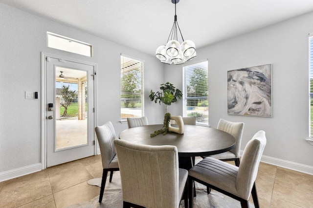 2009 Palos Verdes, Leander, TX 78641 - dining area featuring light tile patterned flooring and a chandelier