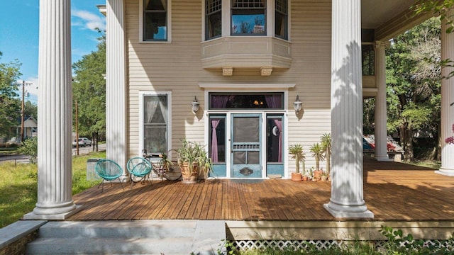 124 N Hamilton St, Gonzales, TX 78629 - doorway to property with a wooden deck