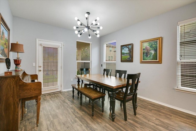 806 Thrasher Glade Dr, Pflugerville, TX 78660 - dining area with a chandelier and wood finished floors
