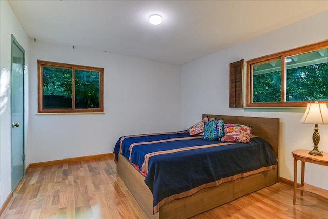 19 Sugar Shack Dr, West Lake Hills, TX 78746 - bedroom featuring wood finished floors and baseboards