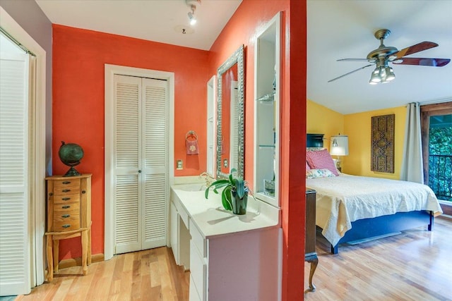 19 Sugar Shack Dr, West Lake Hills, TX 78746 - bedroom with wood finished floors, lofted ceiling, ceiling fan, and a closet