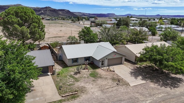 213 Circle C Ave, Fort Davis, TX 79734 - aerial view of property and surrounding area with a mountain backdrop