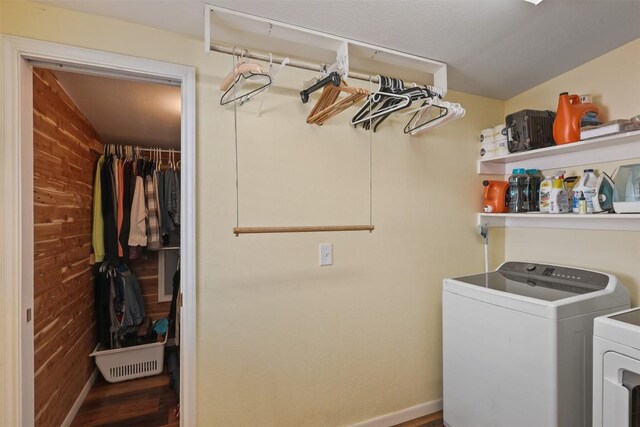 213 Circle C Ave, Fort Davis, TX 79734 - laundry area with independent washer and dryer, wood finished floors, and wooden walls