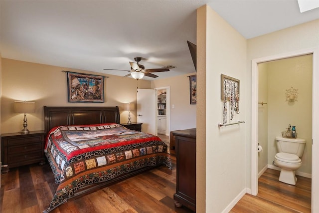 213 Circle C Ave, Fort Davis, TX 79734 - bedroom with wood finished floors, ensuite bath, and ceiling fan