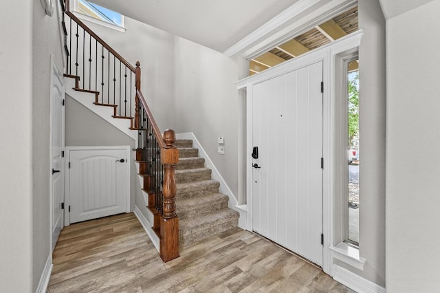 4024 Camacho St, Austin, TX 78723 - entrance foyer featuring stairway and light wood-type flooring