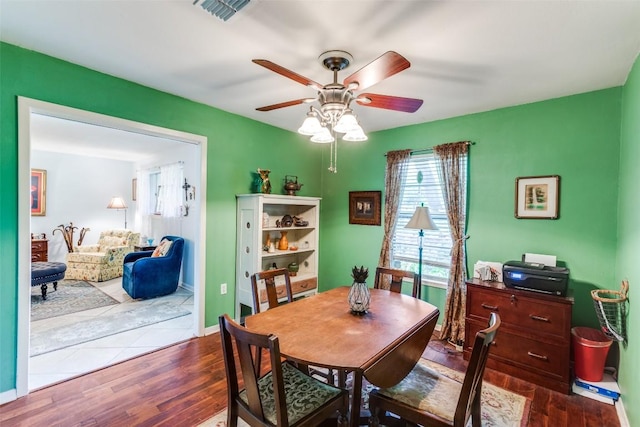 107 W Caddo St, Austin, TX 78753 - dining area featuring ceiling fan, dark wood-type flooring, and an office area
