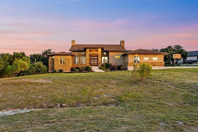 179 Sandy Creek Cv, Driftwood, TX 78619 - view of front of house featuring french doors, a front yard, and a chimney