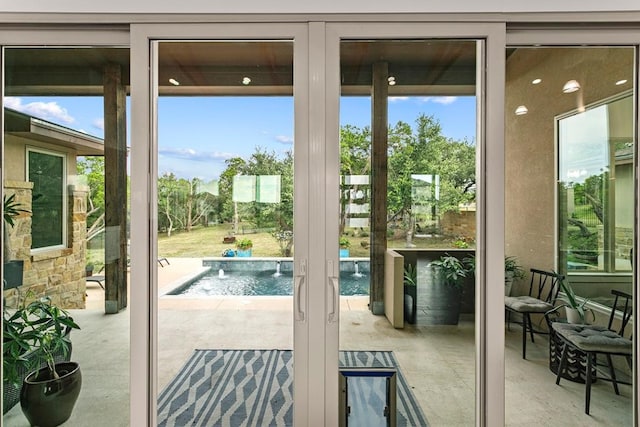 179 Sandy Creek Cv, Driftwood, TX 78619 - entryway featuring plenty of natural light and concrete floors