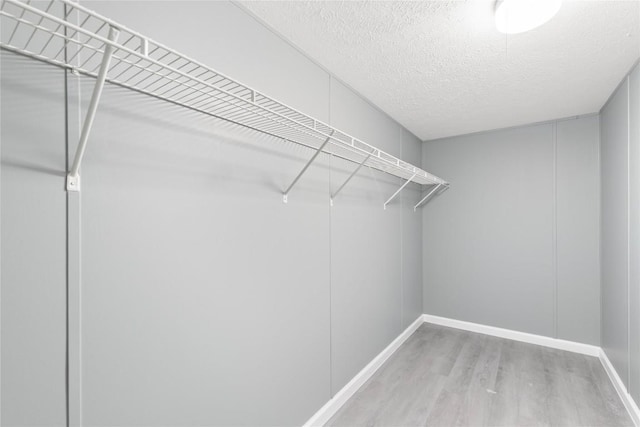 754 Altwein Ln, New Braunfels, TX 78130 - spacious closet featuring wood finished floors