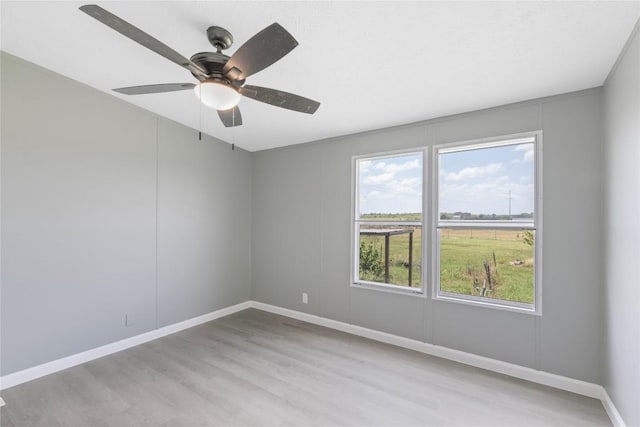 754 Altwein Ln, New Braunfels, TX 78130 - empty room featuring wood finished floors and a ceiling fan