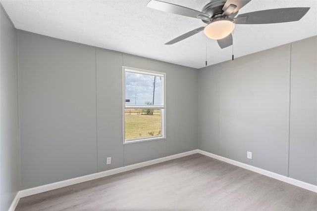 754 Altwein Ln, New Braunfels, TX 78130 - empty room with wood finished floors and ceiling fan