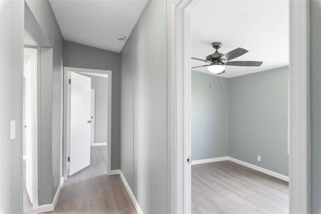 754 Altwein Ln, New Braunfels, TX 78130 - hallway featuring wood finished floors and baseboards