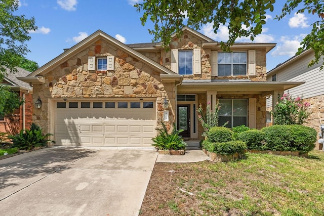 829 Zappa Dr, Cedar Park, TX 78613 - view of front of home with stone siding, concrete driveway, and an attached garage