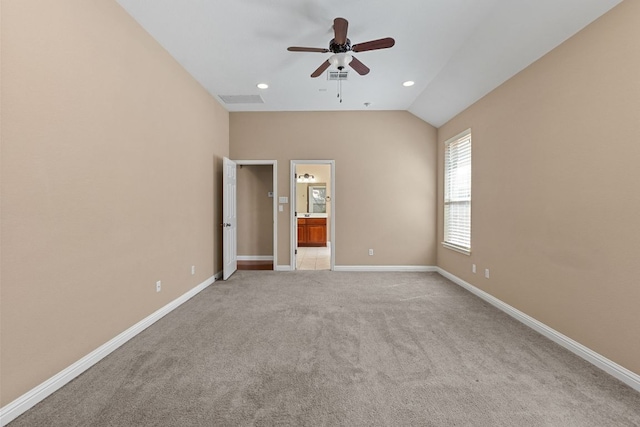829 Zappa Dr, Cedar Park, TX 78613 - unfurnished bedroom with light carpet, lofted ceiling, connected bathroom, recessed lighting, and ceiling fan