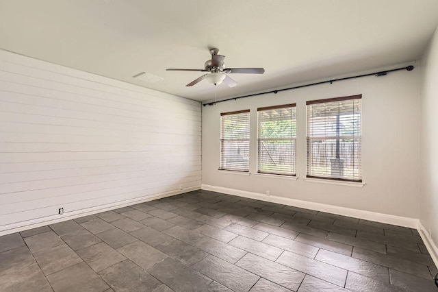 400 Hummingbird Ln, Leander, TX 78641 - spare room featuring ceiling fan and baseboards
